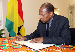 ACP Secretary General Dr Mohamed Ibn Chambas signs condolence book for late President John Atta Mills in Brussels.